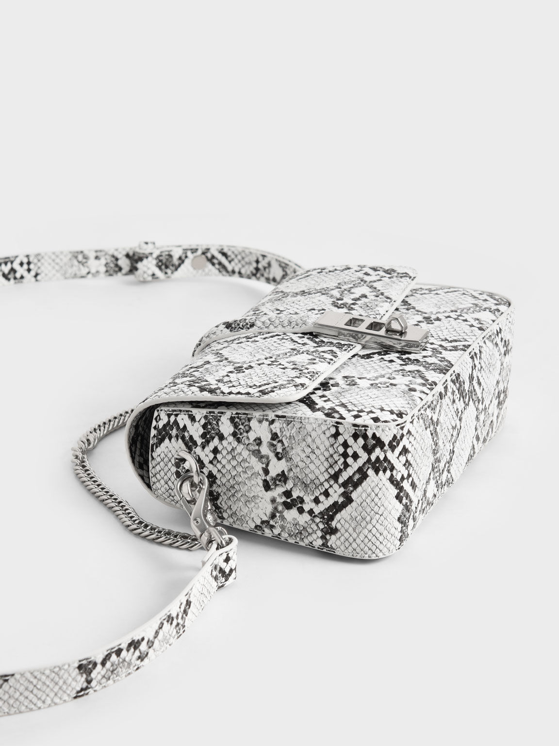 White snake print outlet bag